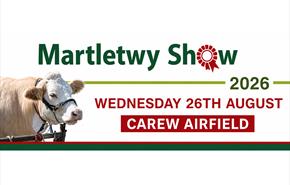 Martletwy Show 2026 promotional banner featuring a prize cow, with the text: "Martletwy Show 2026 – Wednesday 26th August – Carew Airfield."